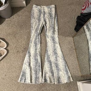 Women’s flared SnakeSkin jeans from Altar’d State
